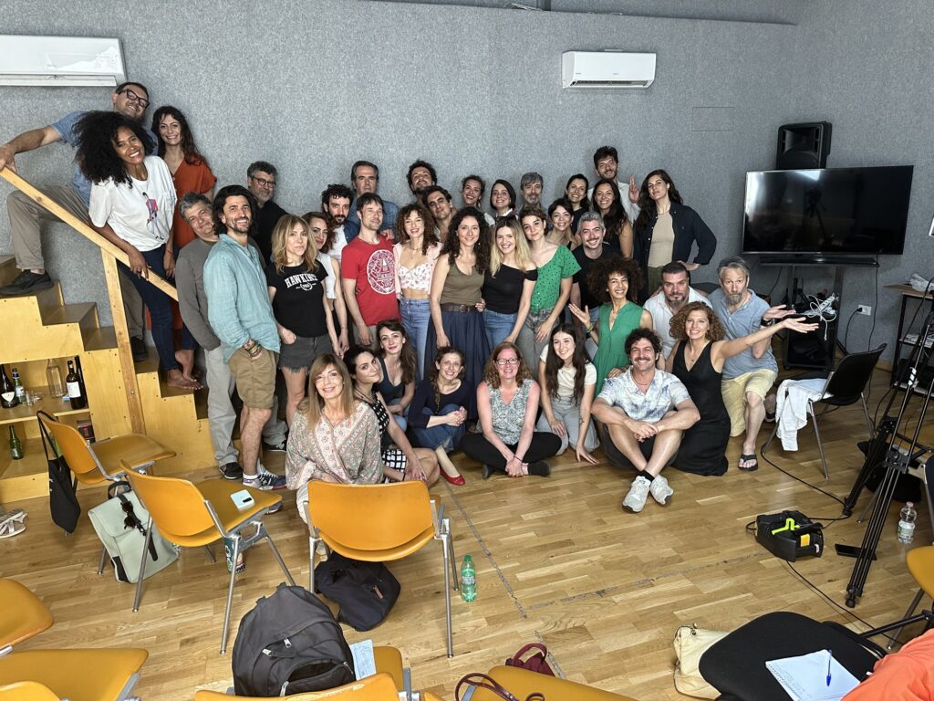 Students posing with international guests Kimberly Graham and Jhon Kellam at Mob Studios