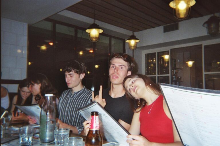 A pizzeria dinner among menus and glasses