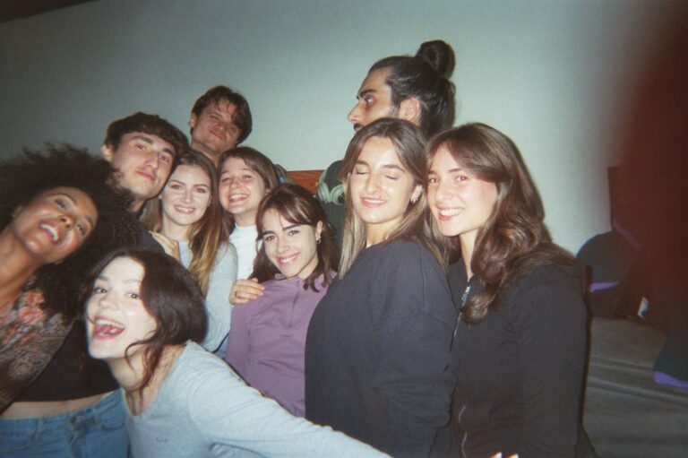 A group of students squeezed into a group photo