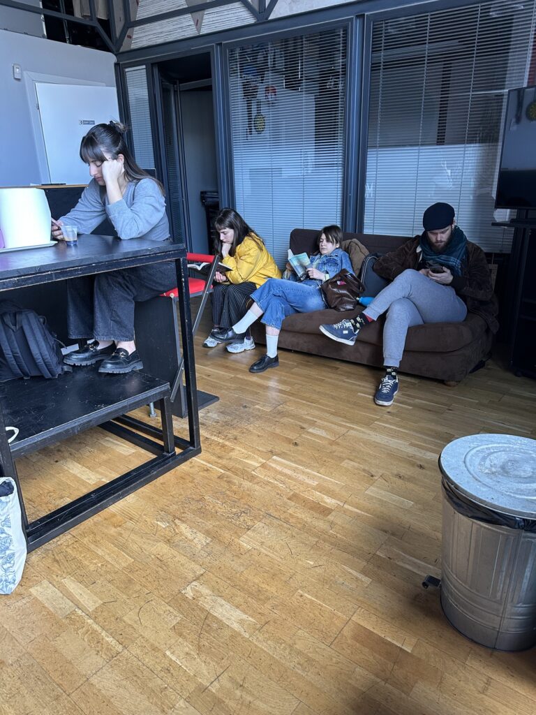 Students on the entrance sofa seen from above