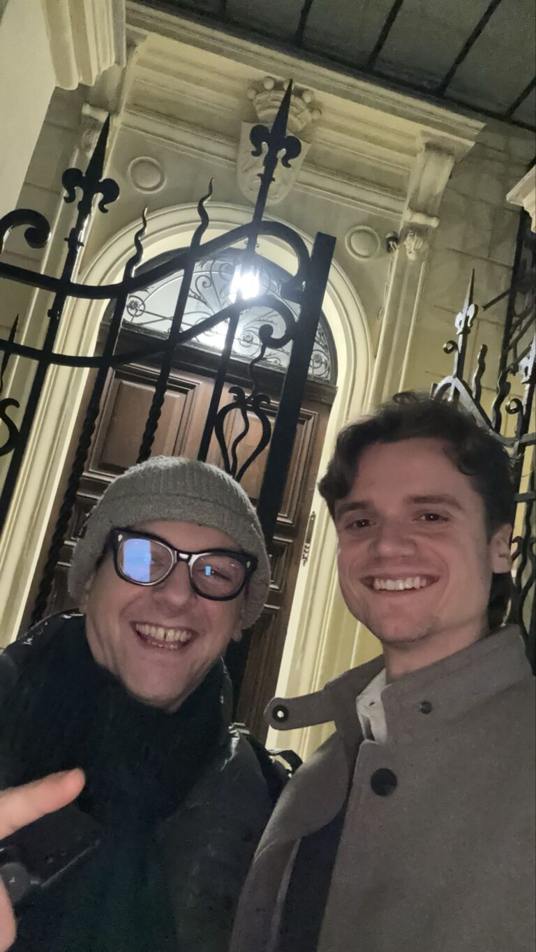 An evening selfie in front of a period doorway
