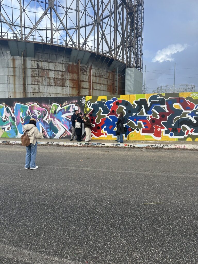 Outdoor shooting in front of the Gazometro and the graffiti
